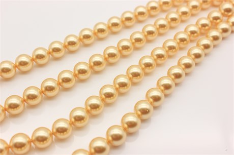 Жемчуг Swarovski 5810 10 мм Crystal Gold Pearl 1 шт SW-385 - фото 41054